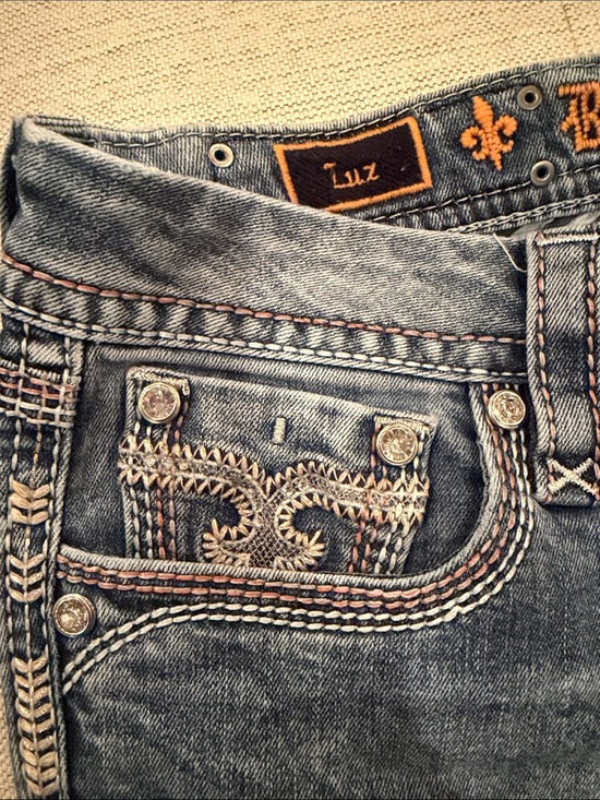 Rock Revival Denim - Rock Revival “LUZ” Distressed Boot Cut Light Blue Flare Jeans